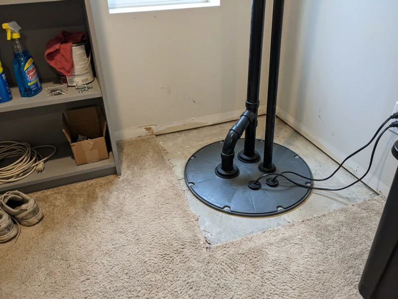 Airtight sealed basin lid with grommets around the pipe and cord